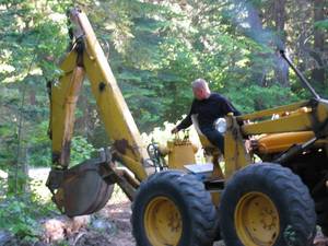 3712SkyClimb_on_backhoe-med.jpg