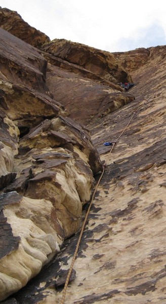 Bill_leading_upper_pitch_on_Epi_under_roof_cropped.jpg